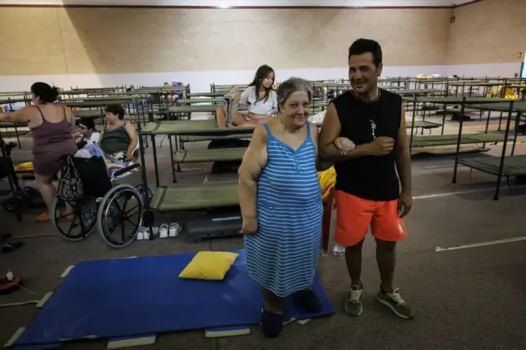 Ildefonsa and her son Christian, walking through the Villamanta sports center
