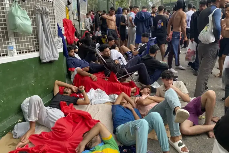 Migrants waiting to enter the interior of the Temporary Stay Center for Immigrants (CETI) in Ceuta.