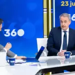 Borges whispers to Zapatero to resist