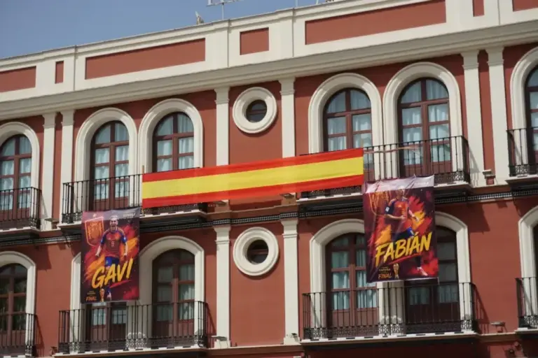 Decorated balconies of bars and private houses.