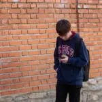 How does the design of Meta's networks harm minors? Do other companies do anything different?