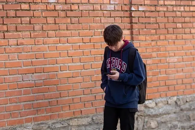 How does the design of Meta's networks harm minors? Do other companies do anything different?