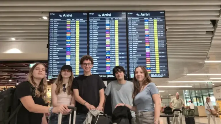 Group of students arriving from Barcelona after a school trip