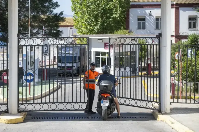 A messenger transports material to the old Military Hospital of Ceuta, adapted as a forensic center.