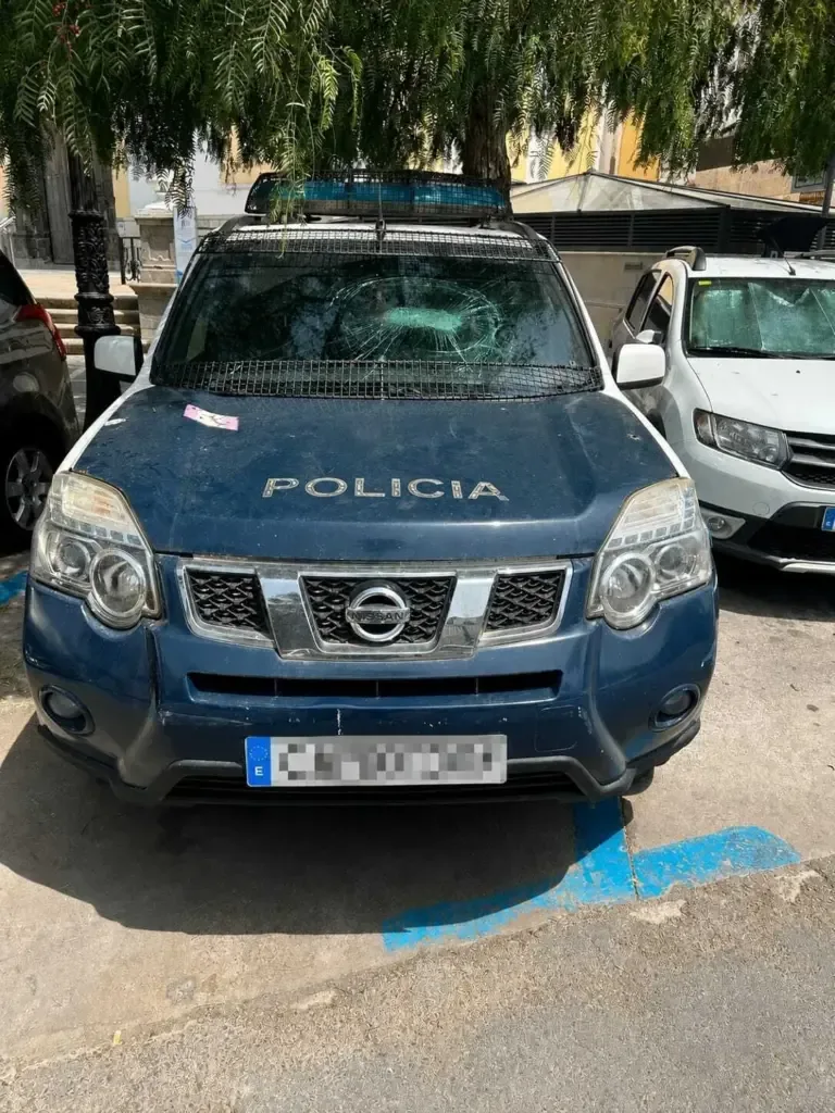 Impact of a stone on a police car.