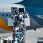 Who are the three million passengers who fly "almost" for free?