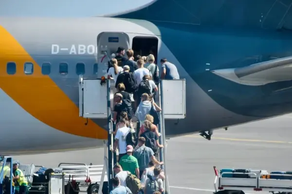Who are the three million passengers who fly "almost" for free?