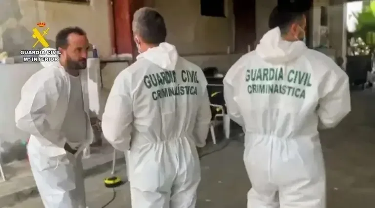 Guardia Civil specialists working on identifying the mortal victims of the Ceuta migration avalanche.