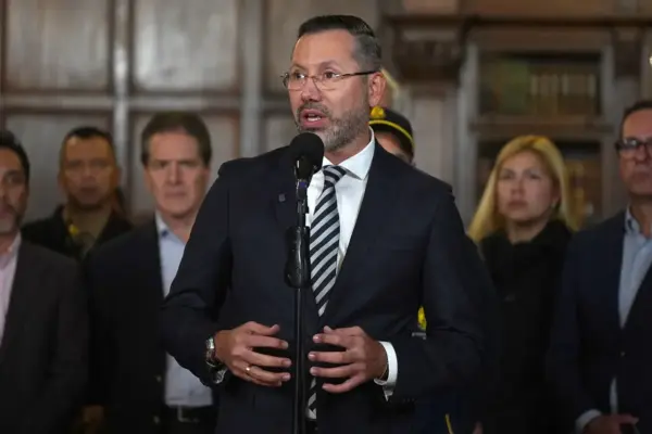 The Colombian Housing Minister on the hot seat for a weekend trip amid the earthquake tragedy