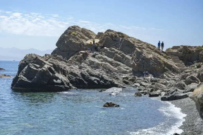 Immigrants jump into the sea at the Ceuta beach of Sarchal.