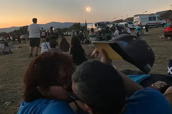 Living a historic eclipse: the shame of the Sun, a rosary, and shouts of "out out out!"