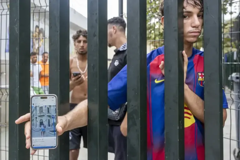 An immigrant inside the Temporary Stay Center for Immigrants (CETI) in Ceuta shows Farah S.'s Instagram profile.