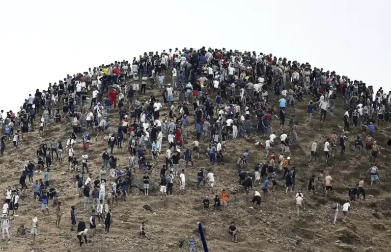 Hundreds of migrants on a hill in Castillejos near the border with Spain on July 31.